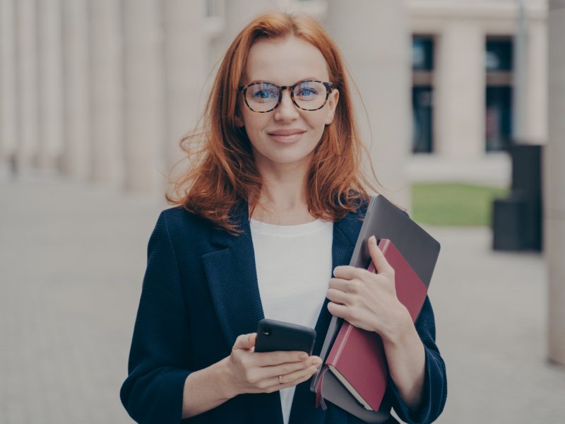 confident-beautiful-red-haired-female-business-consultant-holding-modern-smartphone-and-laptop.jpg confident-beautiful-red-haired-female-business-consultant-holding-modern-smartphone-and-laptop.jpg
