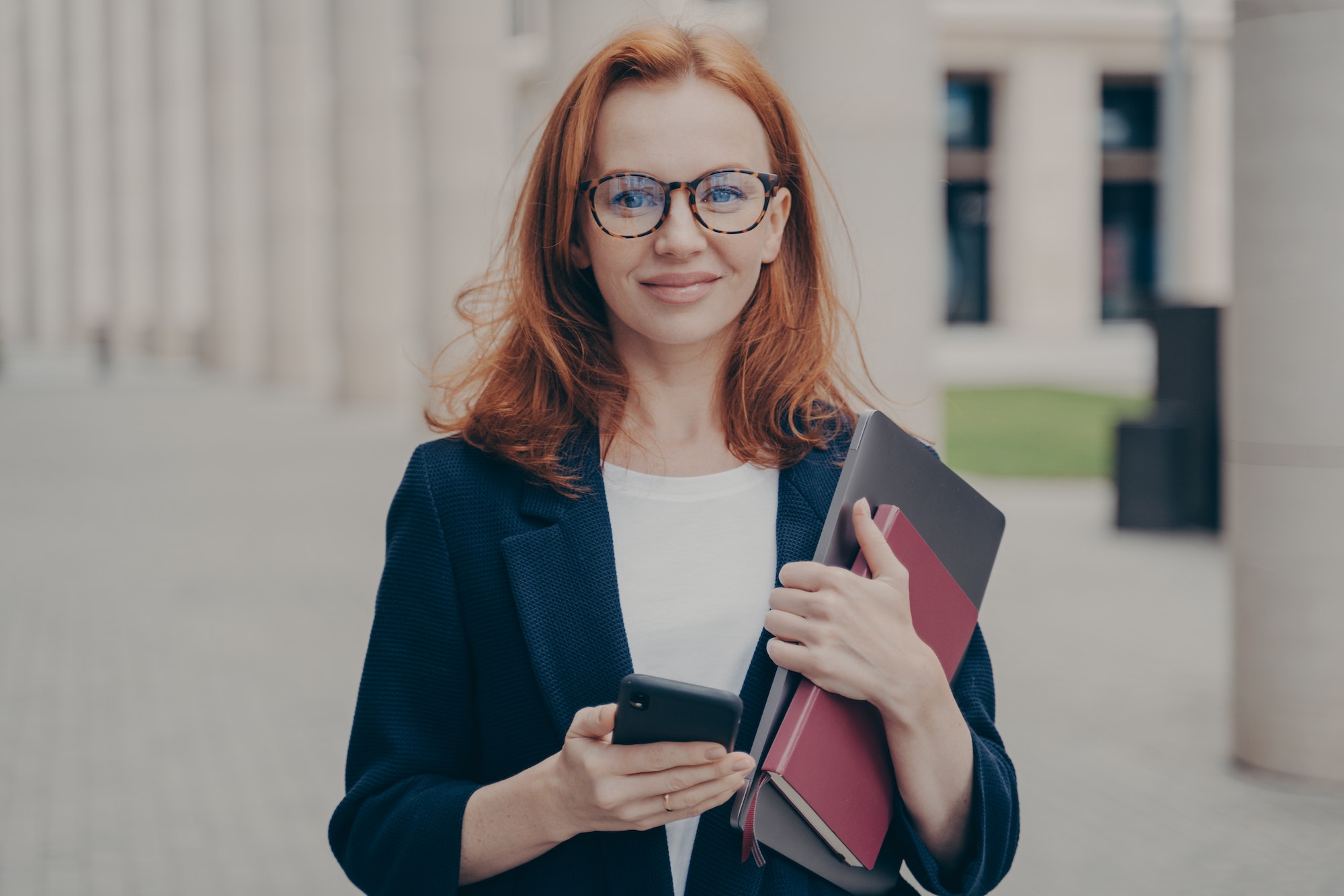 confident-beautiful-red-haired-female-business-consultant-holding-modern-smartphone-and-laptop.jpg confident-beautiful-red-haired-female-business-consultant-holding-modern-smartphone-and-laptop.jpg